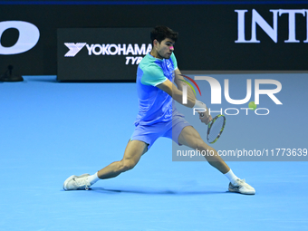 Carlos Alcaraz competes during the Nitto ATP Finals 2024 Group B match against Andrej Rublev at Inalpi Arena in Milan, Italy, on November 13...