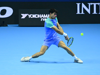 Carlos Alcaraz competes during the Nitto ATP Finals 2024 Group B match against Andrej Rublev at Inalpi Arena in Milan, Italy, on November 13...