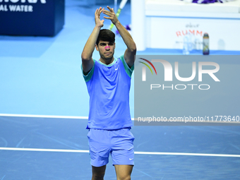 Carlos Alcaraz competes during the Nitto ATP Finals 2024 Group B match against Andrej Rublev at Inalpi Arena in Milan, Italy, on November 13...