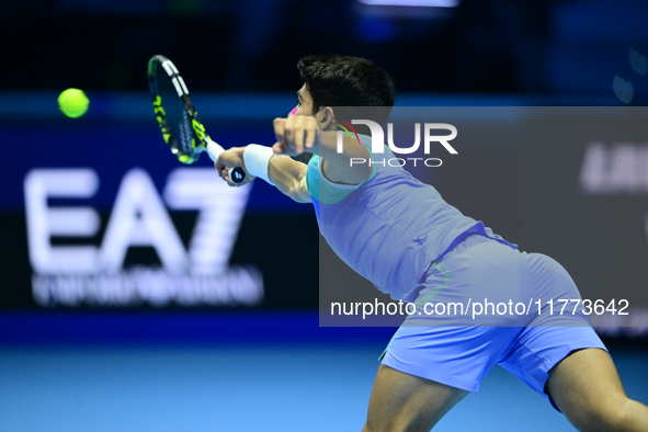 Carlos Alcaraz competes during the Nitto ATP Finals 2024 Group B match against Andrej Rublev at Inalpi Arena in Milan, Italy, on November 13...