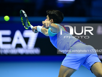 Carlos Alcaraz competes during the Nitto ATP Finals 2024 Group B match against Andrej Rublev at Inalpi Arena in Milan, Italy, on November 13...