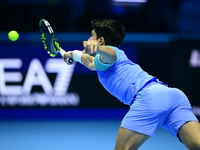 Carlos Alcaraz competes during the Nitto ATP Finals 2024 Group B match against Andrej Rublev at Inalpi Arena in Milan, Italy, on November 13...