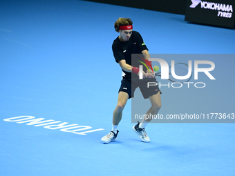 Andrej Rublev competes during the Nitto ATP Finals 2024 Group B match between Carlos Alcaraz and Andrej Rublev at Inalpi Arena in Milan, Ita...