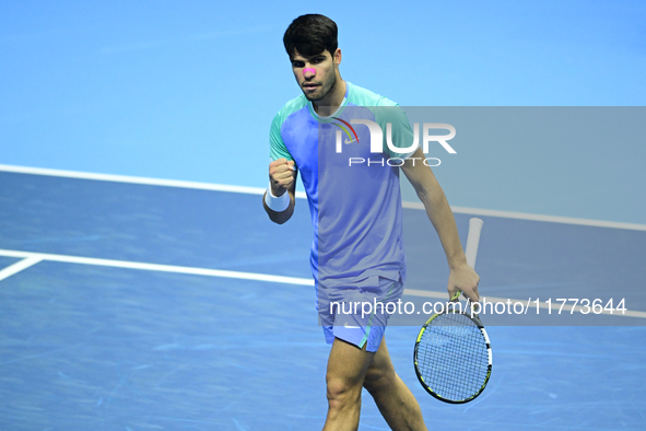 Carlos Alcaraz competes during the Nitto ATP Finals 2024 Group B match against Andrej Rublev at Inalpi Arena in Milan, Italy, on November 13...