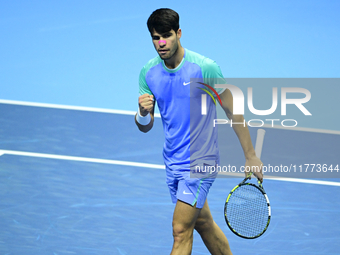 Carlos Alcaraz competes during the Nitto ATP Finals 2024 Group B match against Andrej Rublev at Inalpi Arena in Milan, Italy, on November 13...