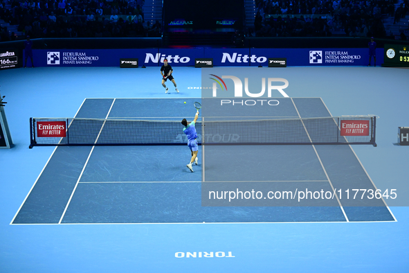 Andrej Rublev and Carlos Alcaraz play during the Nitto ATP Finals 2024 Group B match at Inalpi Arena in Milan, Italy, on November 13, 2024. 