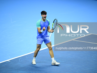 Carlos Alcaraz competes during the Nitto ATP Finals 2024 Group B match against Andrej Rublev at Inalpi Arena in Milan, Italy, on November 13...