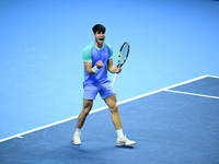 Carlos Alcaraz competes during the Nitto ATP Finals 2024 Group B match against Andrej Rublev at Inalpi Arena in Milan, Italy, on November 13...