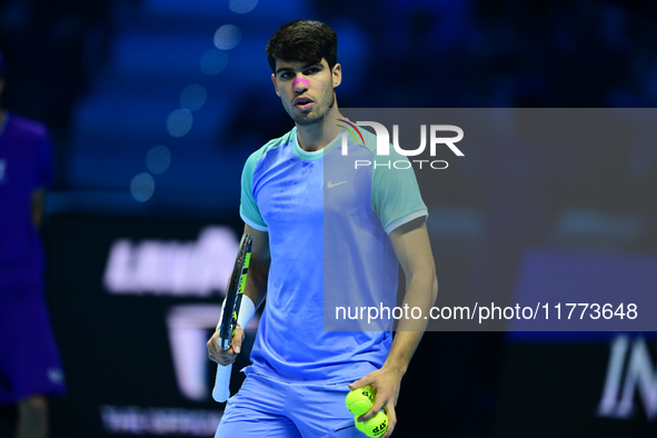 Carlos Alcaraz competes during the Nitto ATP Finals 2024 Group B match against Andrej Rublev at Inalpi Arena in Milan, Italy, on November 13...