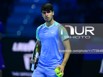 Carlos Alcaraz competes during the Nitto ATP Finals 2024 Group B match against Andrej Rublev at Inalpi Arena in Milan, Italy, on November 13...