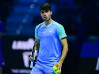 Carlos Alcaraz competes during the Nitto ATP Finals 2024 Group B match against Andrej Rublev at Inalpi Arena in Milan, Italy, on November 13...