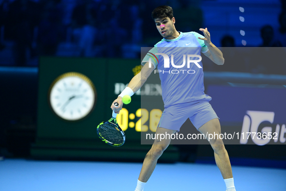 Carlos Alcaraz competes during the Nitto ATP Finals 2024 Group B match against Andrej Rublev at Inalpi Arena in Milan, Italy, on November 13...