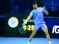 Carlos Alcaraz competes during the Nitto ATP Finals 2024 Group B match against Andrej Rublev at Inalpi Arena in Milan, Italy, on November 13...