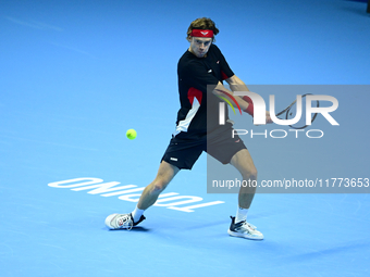 Andrej Rublev competes during the Nitto ATP Finals 2024 Group B match between Carlos Alcaraz and Andrej Rublev at Inalpi Arena in Milan, Ita...