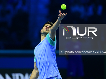 Carlos Alcaraz competes during the Nitto ATP Finals 2024 Group B match against Andrej Rublev at Inalpi Arena in Milan, Italy, on November 13...