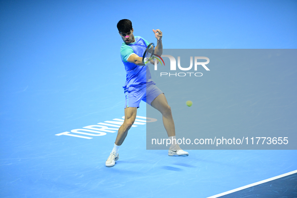 Carlos Alcaraz competes during the Nitto ATP Finals 2024 Group B match against Andrej Rublev at Inalpi Arena in Milan, Italy, on November 13...