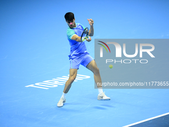 Carlos Alcaraz competes during the Nitto ATP Finals 2024 Group B match against Andrej Rublev at Inalpi Arena in Milan, Italy, on November 13...