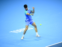 Carlos Alcaraz competes during the Nitto ATP Finals 2024 Group B match against Andrej Rublev at Inalpi Arena in Milan, Italy, on November 13...