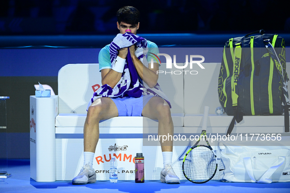 Carlos Alcaraz competes during the Nitto ATP Finals 2024 Group B match against Andrej Rublev at Inalpi Arena in Milan, Italy, on November 13...