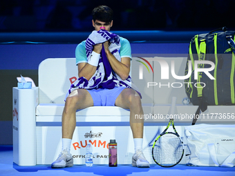 Carlos Alcaraz competes during the Nitto ATP Finals 2024 Group B match against Andrej Rublev at Inalpi Arena in Milan, Italy, on November 13...