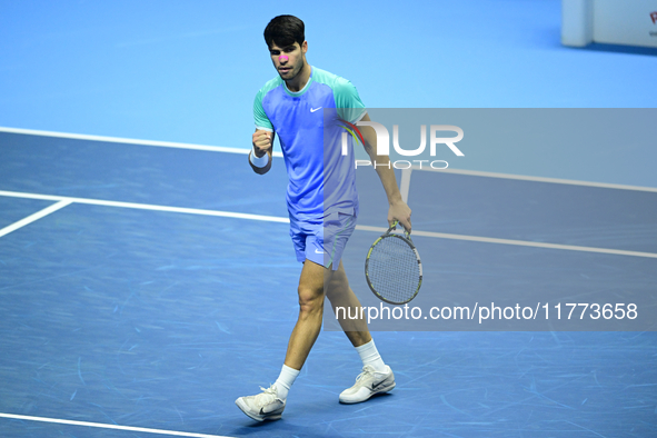 Carlos Alcaraz competes during the Nitto ATP Finals 2024 Group B match against Andrej Rublev at Inalpi Arena in Milan, Italy, on November 13...