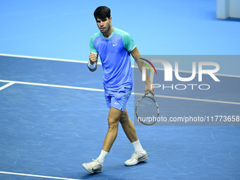 Carlos Alcaraz competes during the Nitto ATP Finals 2024 Group B match against Andrej Rublev at Inalpi Arena in Milan, Italy, on November 13...