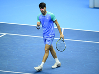 Carlos Alcaraz competes during the Nitto ATP Finals 2024 Group B match against Andrej Rublev at Inalpi Arena in Milan, Italy, on November 13...