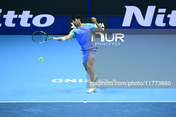 Carlos Alcaraz competes during the Nitto ATP Finals 2024 Group B match against Andrej Rublev at Inalpi Arena in Milan, Italy, on November 13...