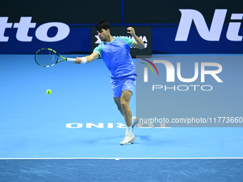 Carlos Alcaraz competes during the Nitto ATP Finals 2024 Group B match against Andrej Rublev at Inalpi Arena in Milan, Italy, on November 13...