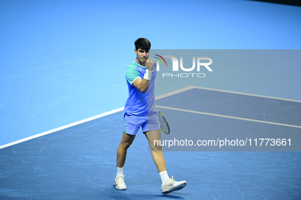 Carlos Alcaraz competes during the Nitto ATP Finals 2024 Group B match against Andrej Rublev at Inalpi Arena in Milan, Italy, on November 13...