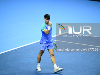 Carlos Alcaraz competes during the Nitto ATP Finals 2024 Group B match against Andrej Rublev at Inalpi Arena in Milan, Italy, on November 13...