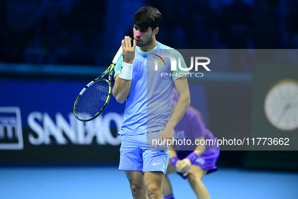 Carlos Alcaraz competes during the Nitto ATP Finals 2024 Group B match against Andrej Rublev at Inalpi Arena in Milan, Italy, on November 13...