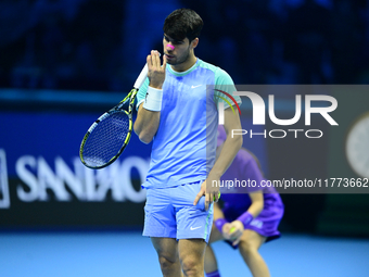 Carlos Alcaraz competes during the Nitto ATP Finals 2024 Group B match against Andrej Rublev at Inalpi Arena in Milan, Italy, on November 13...