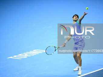 Carlos Alcaraz competes during the Nitto ATP Finals 2024 Group B match against Andrej Rublev at Inalpi Arena in Milan, Italy, on November 13...