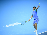 Carlos Alcaraz competes during the Nitto ATP Finals 2024 Group B match against Andrej Rublev at Inalpi Arena in Milan, Italy, on November 13...