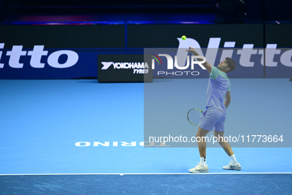 Carlos Alcaraz competes during the Nitto ATP Finals 2024 Group B match against Andrej Rublev at Inalpi Arena in Milan, Italy, on November 13...