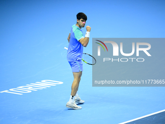 Carlos Alcaraz competes during the Nitto ATP Finals 2024 Group B match against Andrej Rublev at Inalpi Arena in Milan, Italy, on November 13...