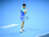 Carlos Alcaraz competes during the Nitto ATP Finals 2024 Group B match against Andrej Rublev at Inalpi Arena in Milan, Italy, on November 13...