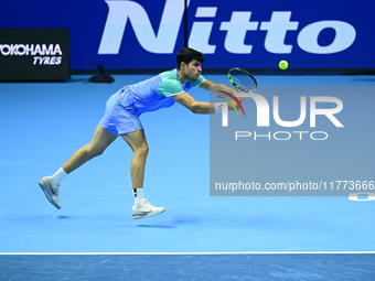 Carlos Alcaraz competes during the Nitto ATP Finals 2024 Group B match against Andrej Rublev at Inalpi Arena in Milan, Italy, on November 13...