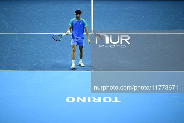 Carlos Alcaraz competes during the Nitto ATP Finals 2024 Group B match against Andrej Rublev at Inalpi Arena in Milan, Italy, on November 13...