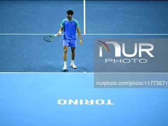 Carlos Alcaraz competes during the Nitto ATP Finals 2024 Group B match against Andrej Rublev at Inalpi Arena in Milan, Italy, on November 13...