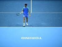 Carlos Alcaraz competes during the Nitto ATP Finals 2024 Group B match against Andrej Rublev at Inalpi Arena in Milan, Italy, on November 13...