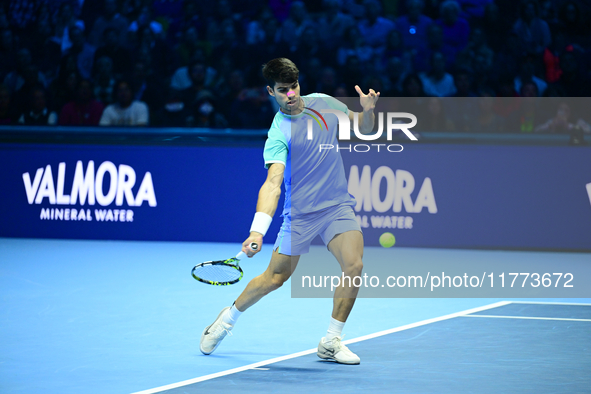 Carlos Alcaraz competes during the Nitto ATP Finals 2024 Group B match against Andrej Rublev at Inalpi Arena in Milan, Italy, on November 13...