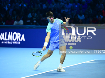 Carlos Alcaraz competes during the Nitto ATP Finals 2024 Group B match against Andrej Rublev at Inalpi Arena in Milan, Italy, on November 13...