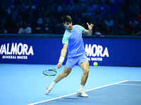 Carlos Alcaraz competes during the Nitto ATP Finals 2024 Group B match against Andrej Rublev at Inalpi Arena in Milan, Italy, on November 13...