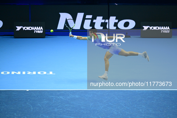 Carlos Alcaraz competes during the Nitto ATP Finals 2024 Group B match against Andrej Rublev at Inalpi Arena in Milan, Italy, on November 13...