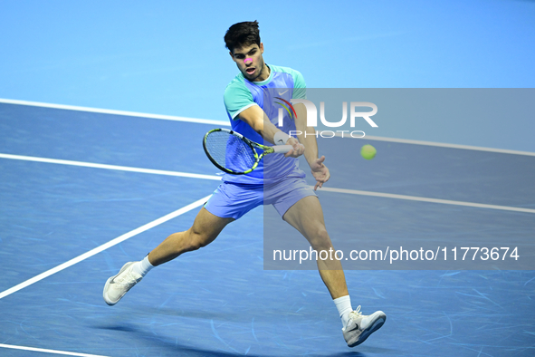 Carlos Alcaraz competes during the Nitto ATP Finals 2024 Group B match against Andrej Rublev at Inalpi Arena in Milan, Italy, on November 13...