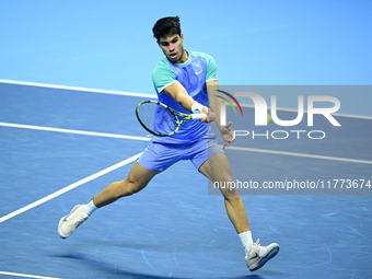 Carlos Alcaraz competes during the Nitto ATP Finals 2024 Group B match against Andrej Rublev at Inalpi Arena in Milan, Italy, on November 13...