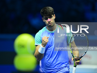 Carlos Alcaraz competes during the Nitto ATP Finals 2024 Group B match against Andrej Rublev at Inalpi Arena in Milan, Italy, on November 13...