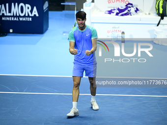 Carlos Alcaraz competes during the Nitto ATP Finals 2024 Group B match against Andrej Rublev at Inalpi Arena in Milan, Italy, on November 13...